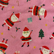 Pattern of Santa Claus and Christmas trees on a pink background